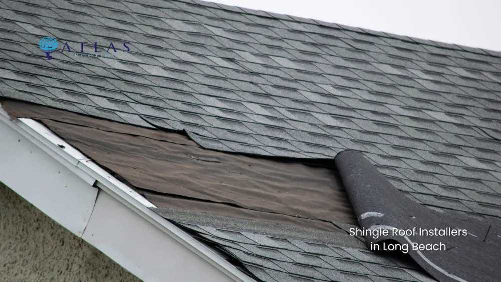xposed roof deck showing shingle damage on Long Beach home